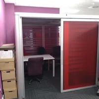 Mobile Meeting Pod with Red Glass Partitions