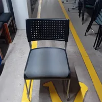 Black Stacking Chair with Perforated Back